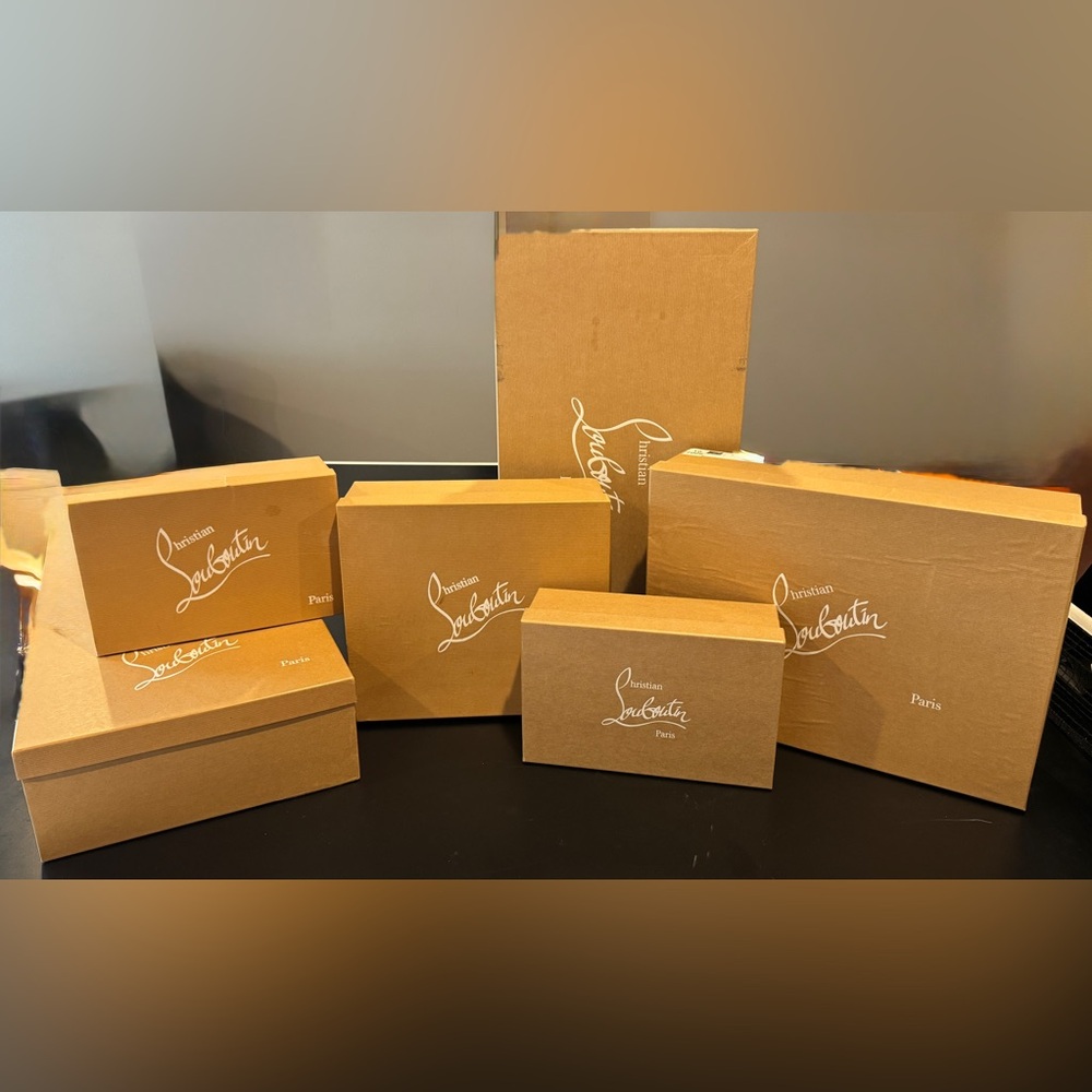 Empty Christian Louboutin shoe and boot boxes